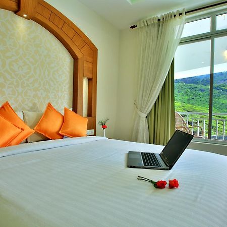 Monsoon Grande Hotel Munnar Exterior foto