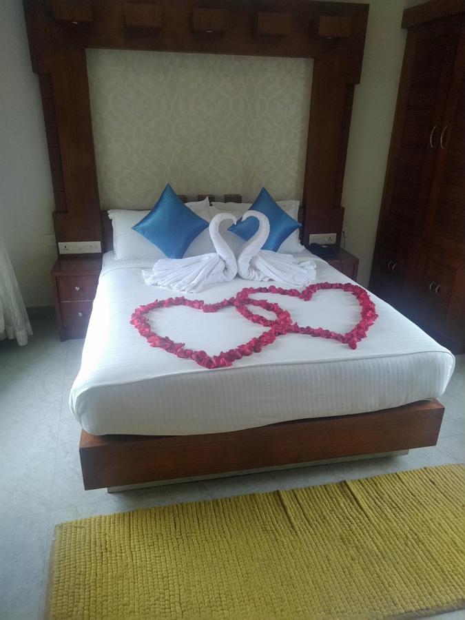 Monsoon Grande Hotel Munnar Exterior foto