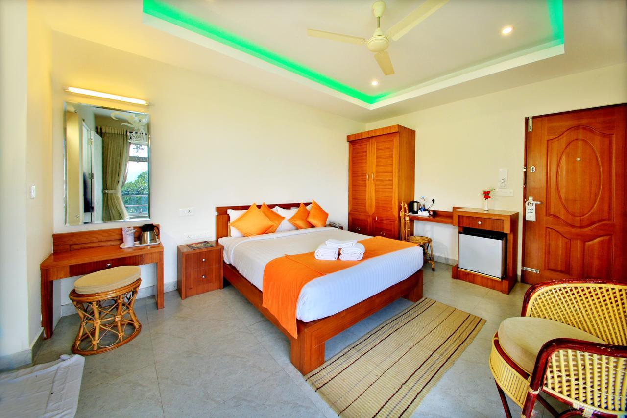 Monsoon Grande Hotel Munnar Exterior foto