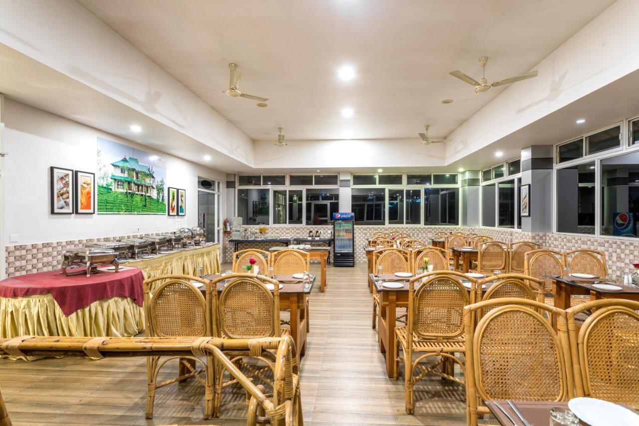 Monsoon Grande Hotel Munnar Exterior foto